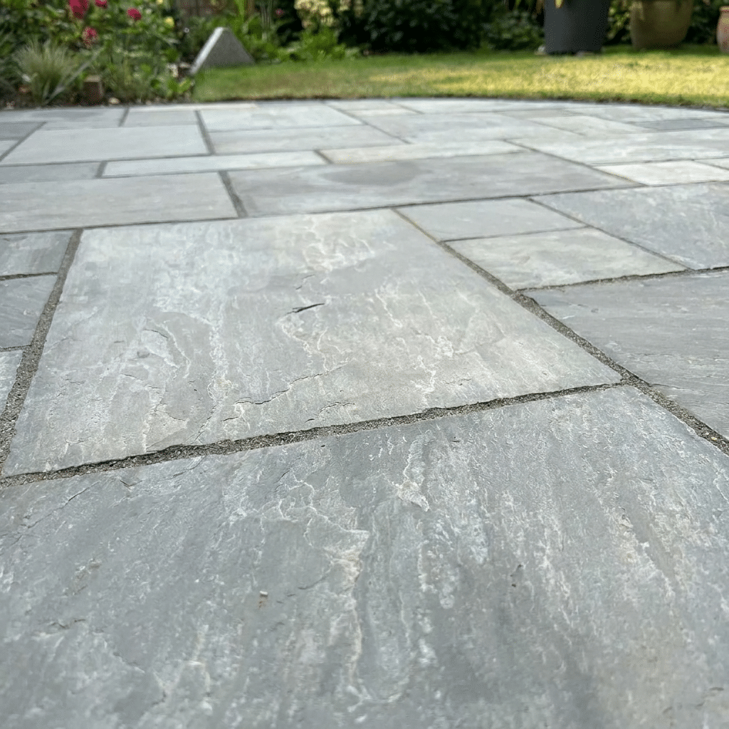 Kandla Grey sandstone paving close up riven surface texture