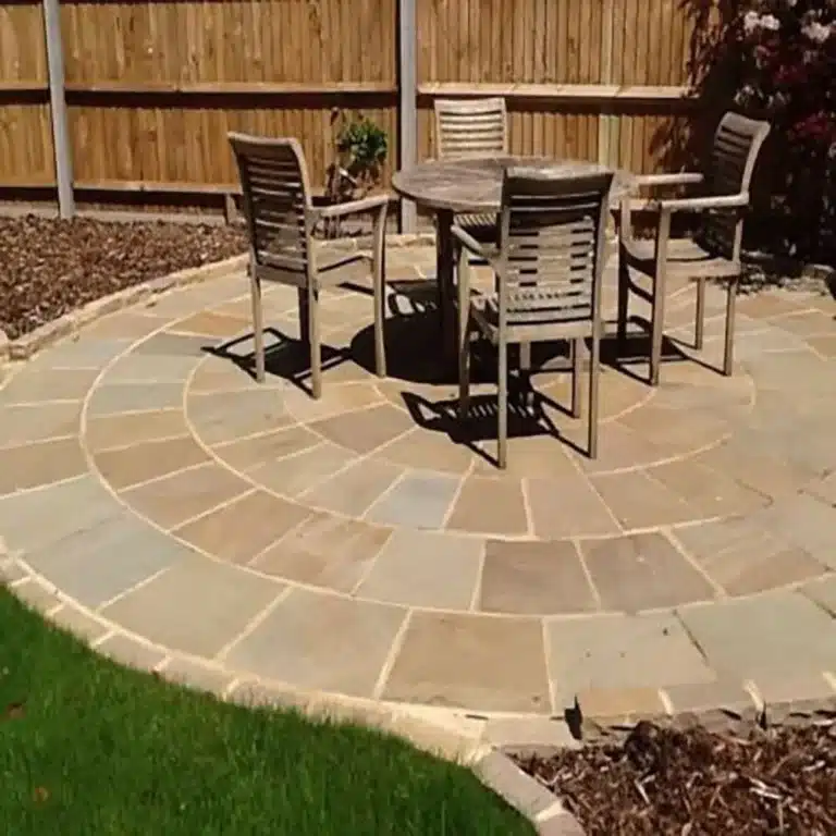 Raj Green Indian sandstone paving circle, 4 metre diameter, natural green, brown and grey tones