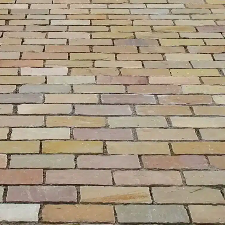 Raj Green Indian sandstone cobble setts, 200 x 100 x 40/60 mm, earthy green and brown tones